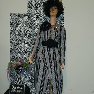 Elegant Striped Long Sleeve Dress with Floral Accent